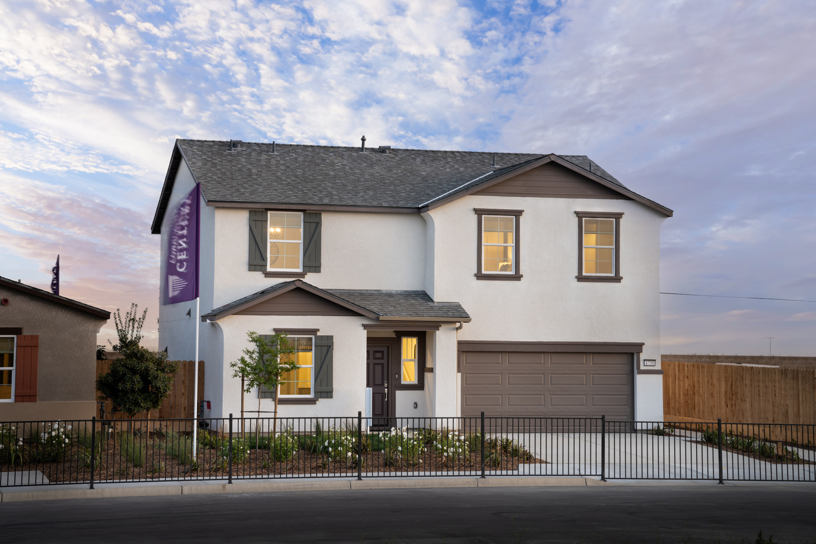 A house with a fence around it.