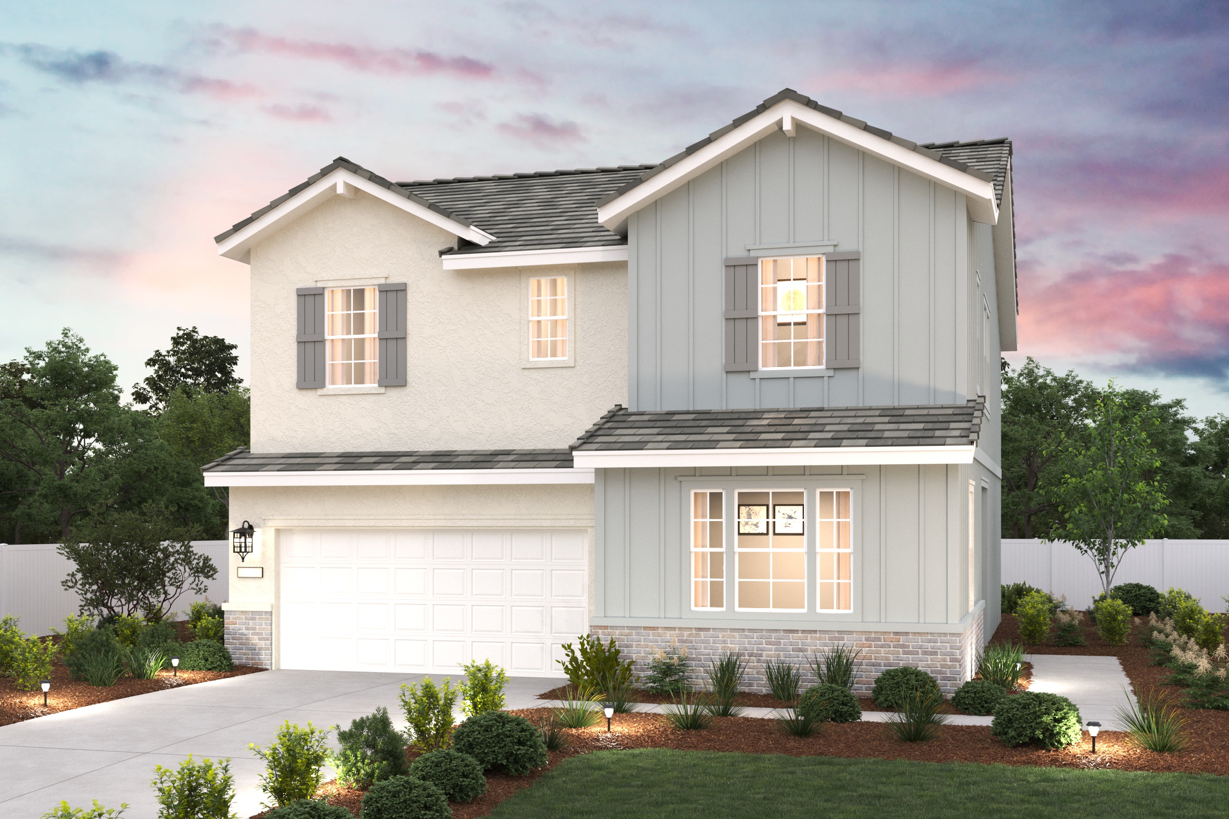 A white house with a driveway.