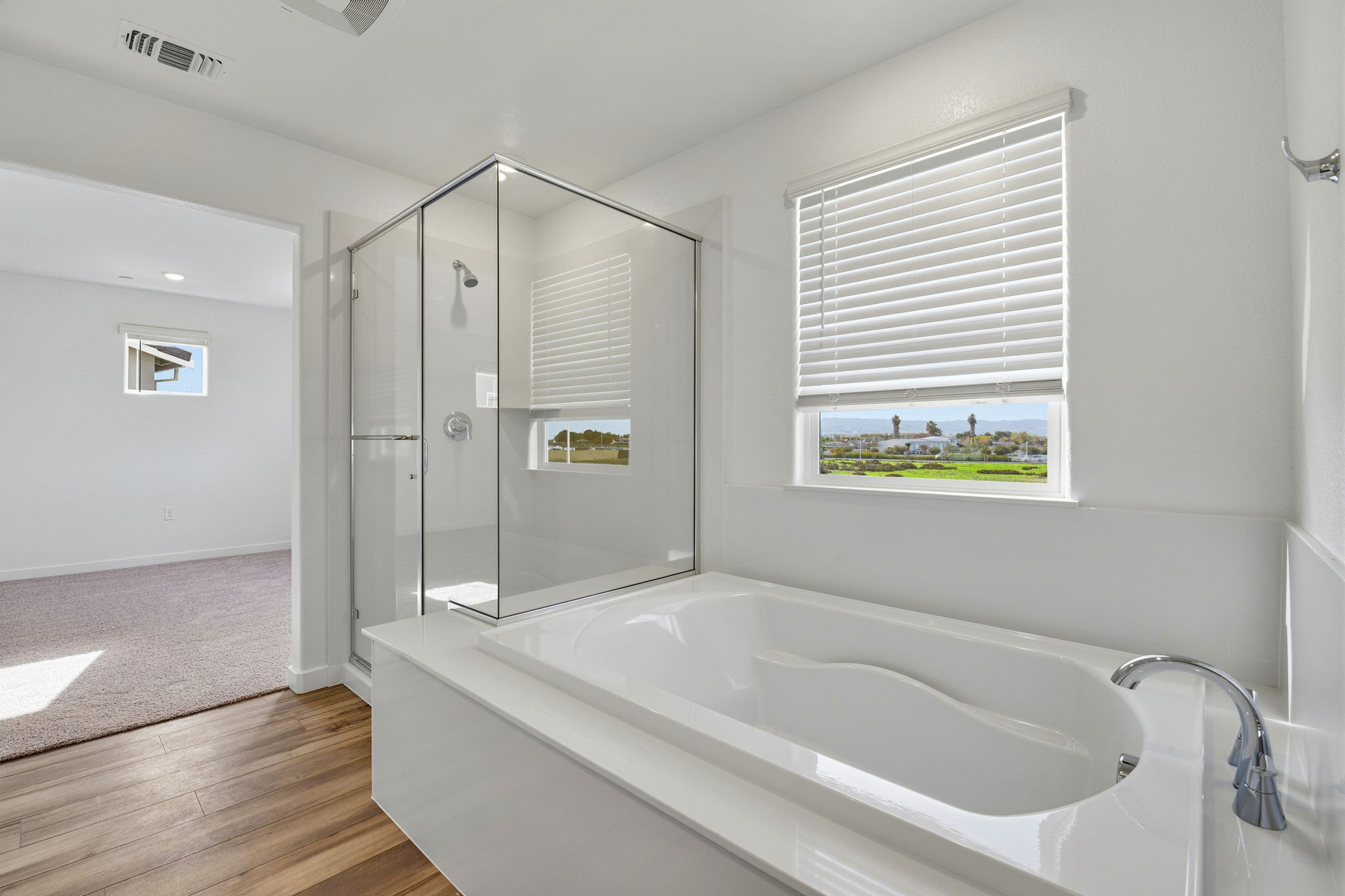 A bathroom with a glass shower.