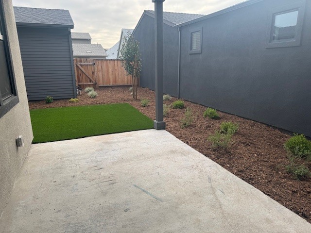 A driveway between two buildings.