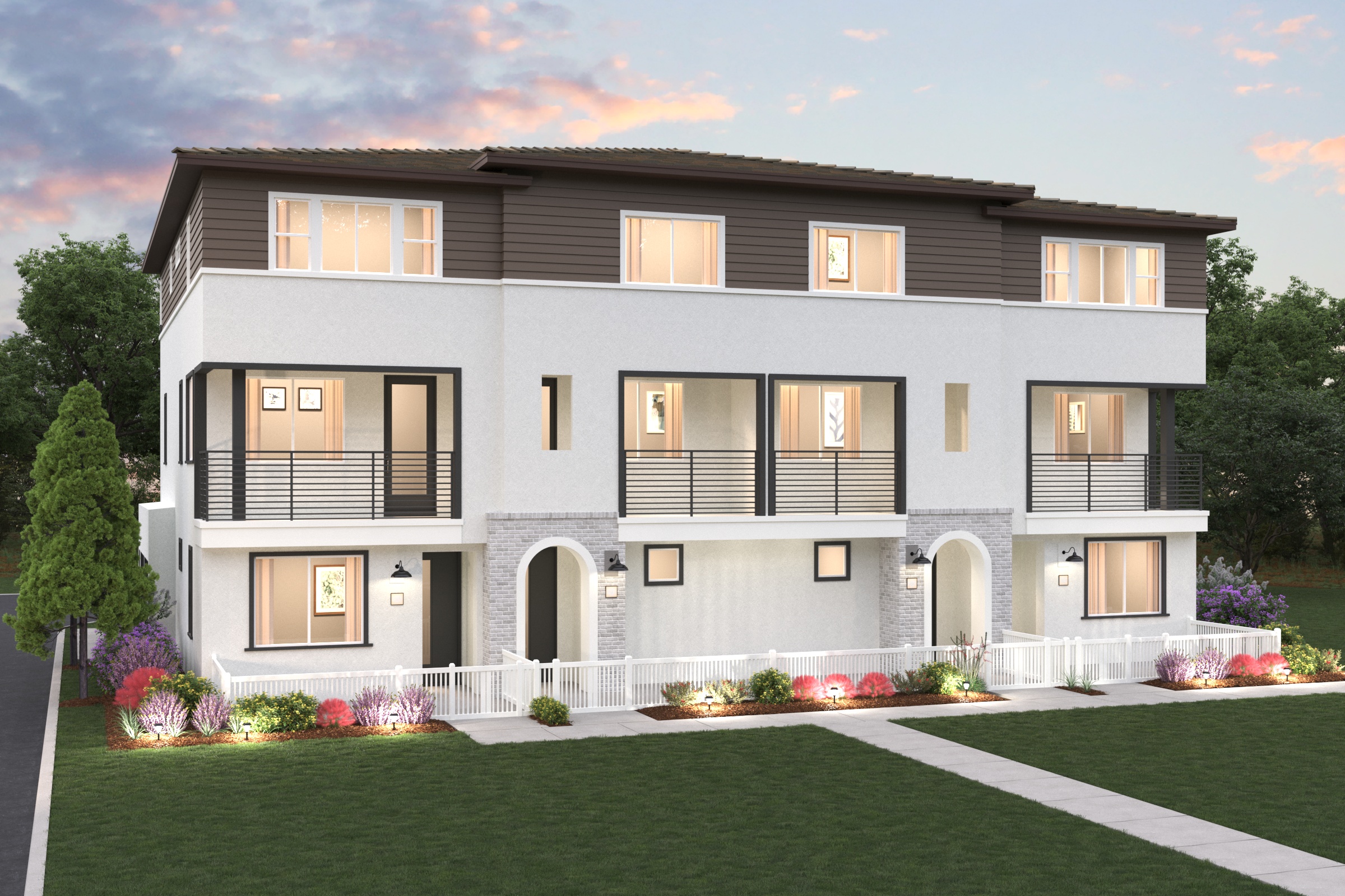 A large house with a lawn in front of it.