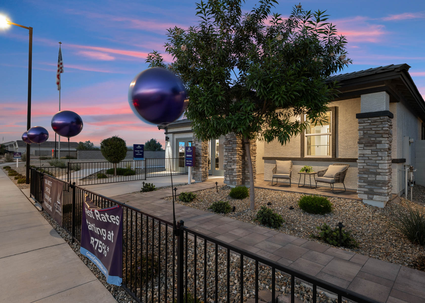 A tree in front of a house.
