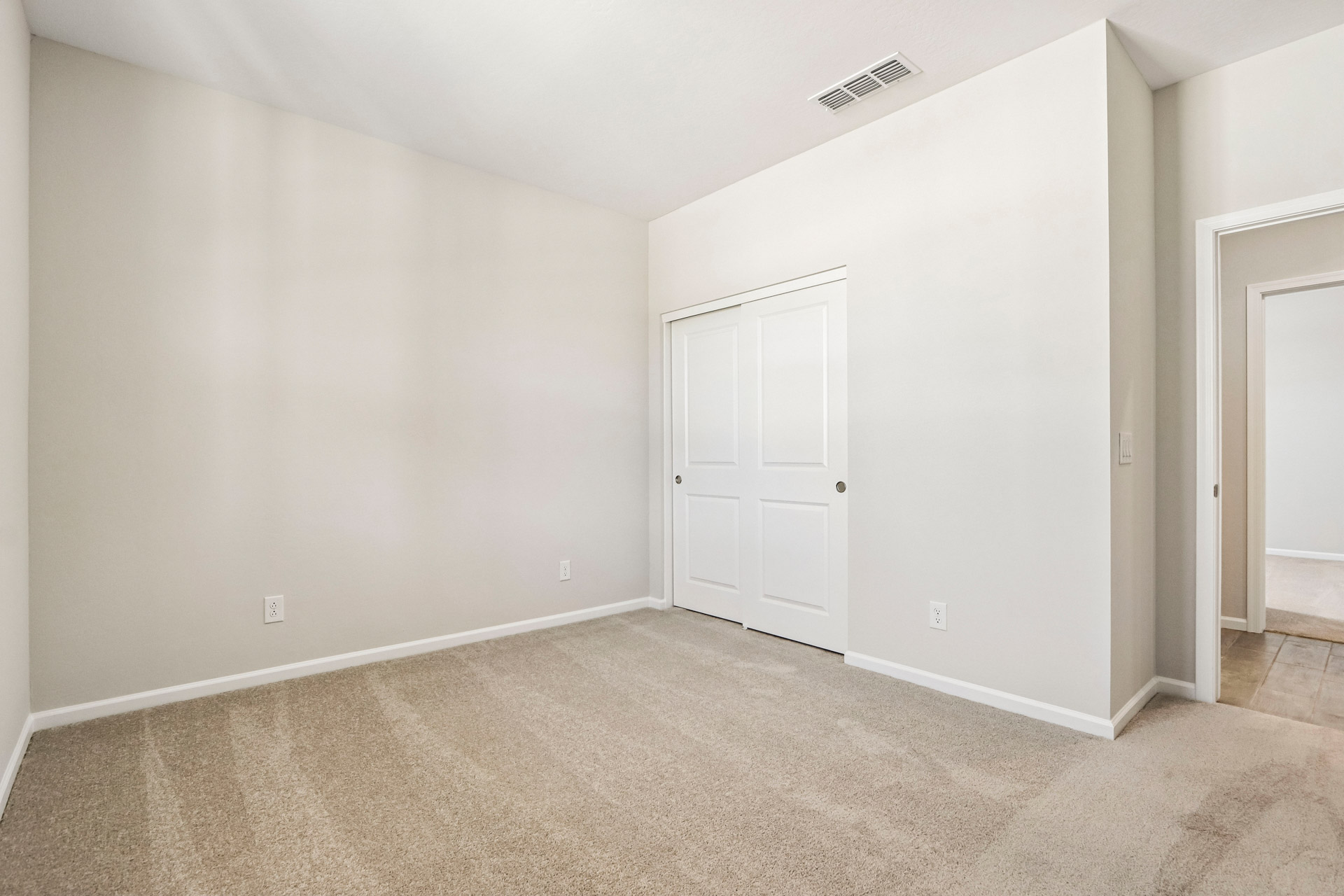 A room with white doors.