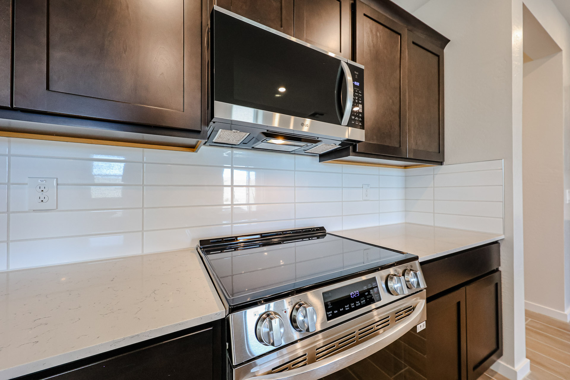 A kitchen with stainless steel appliances.