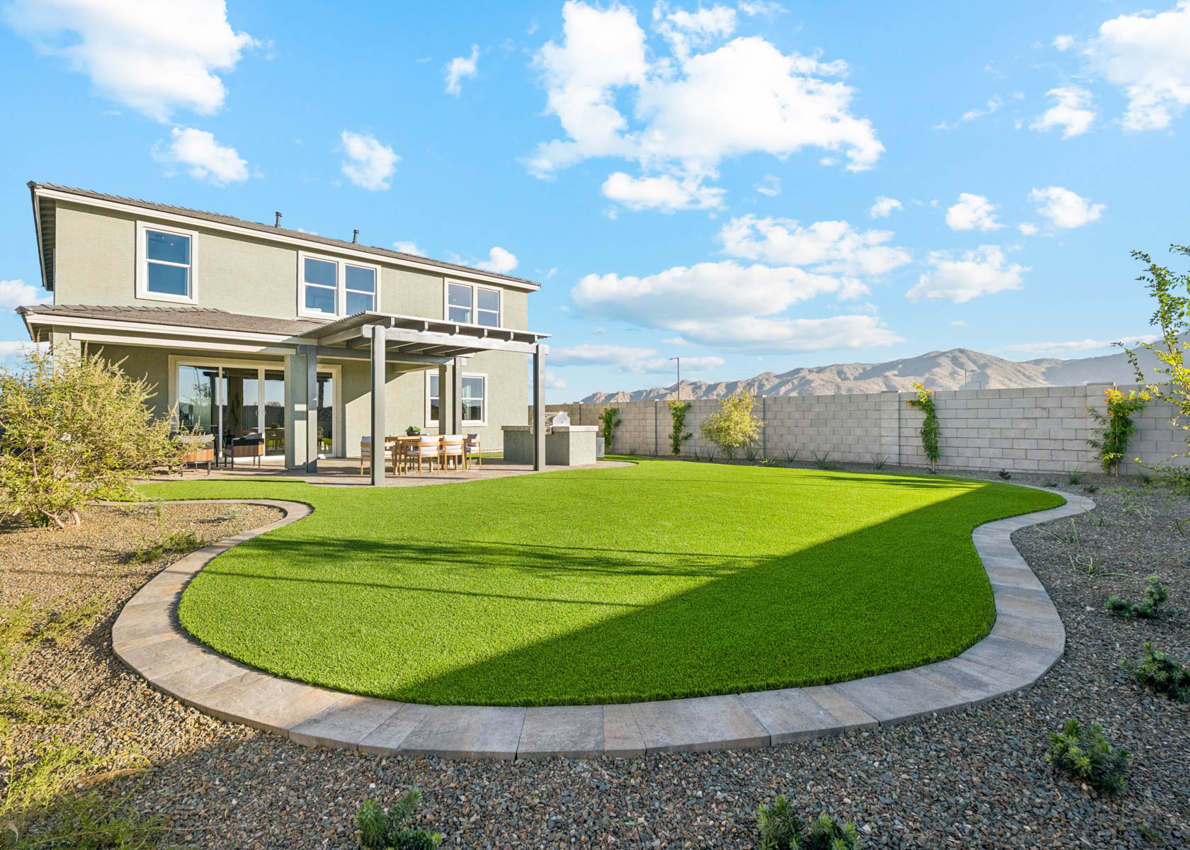 A house with a large lawn.