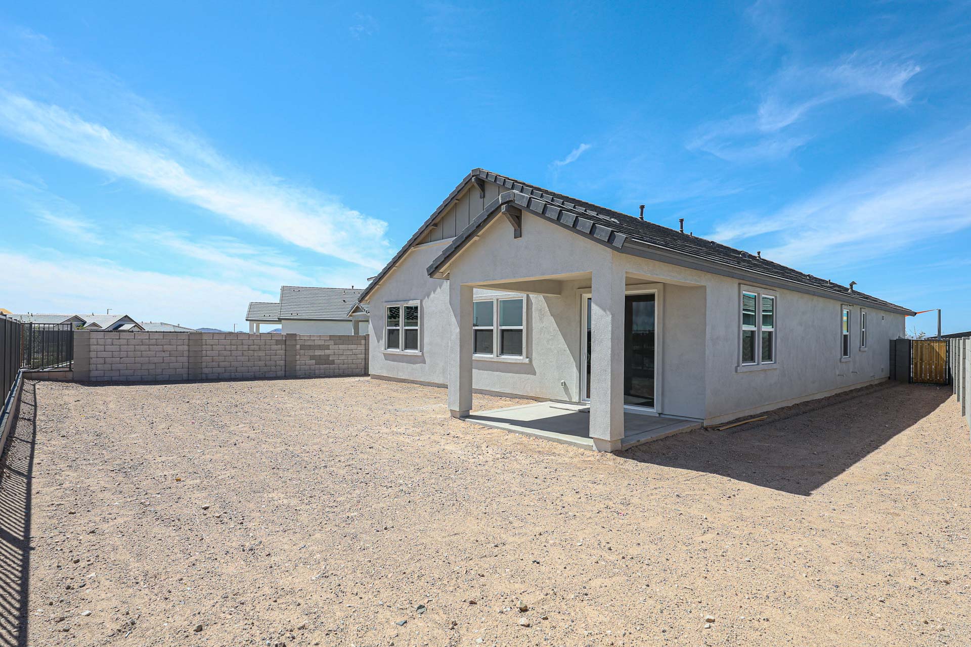 A house with a fence around it.
