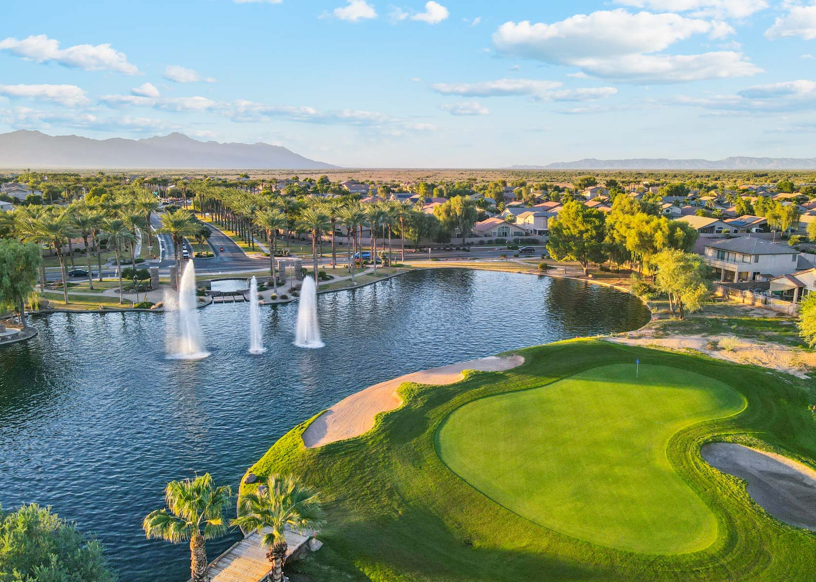 A golf course with a fountain.
