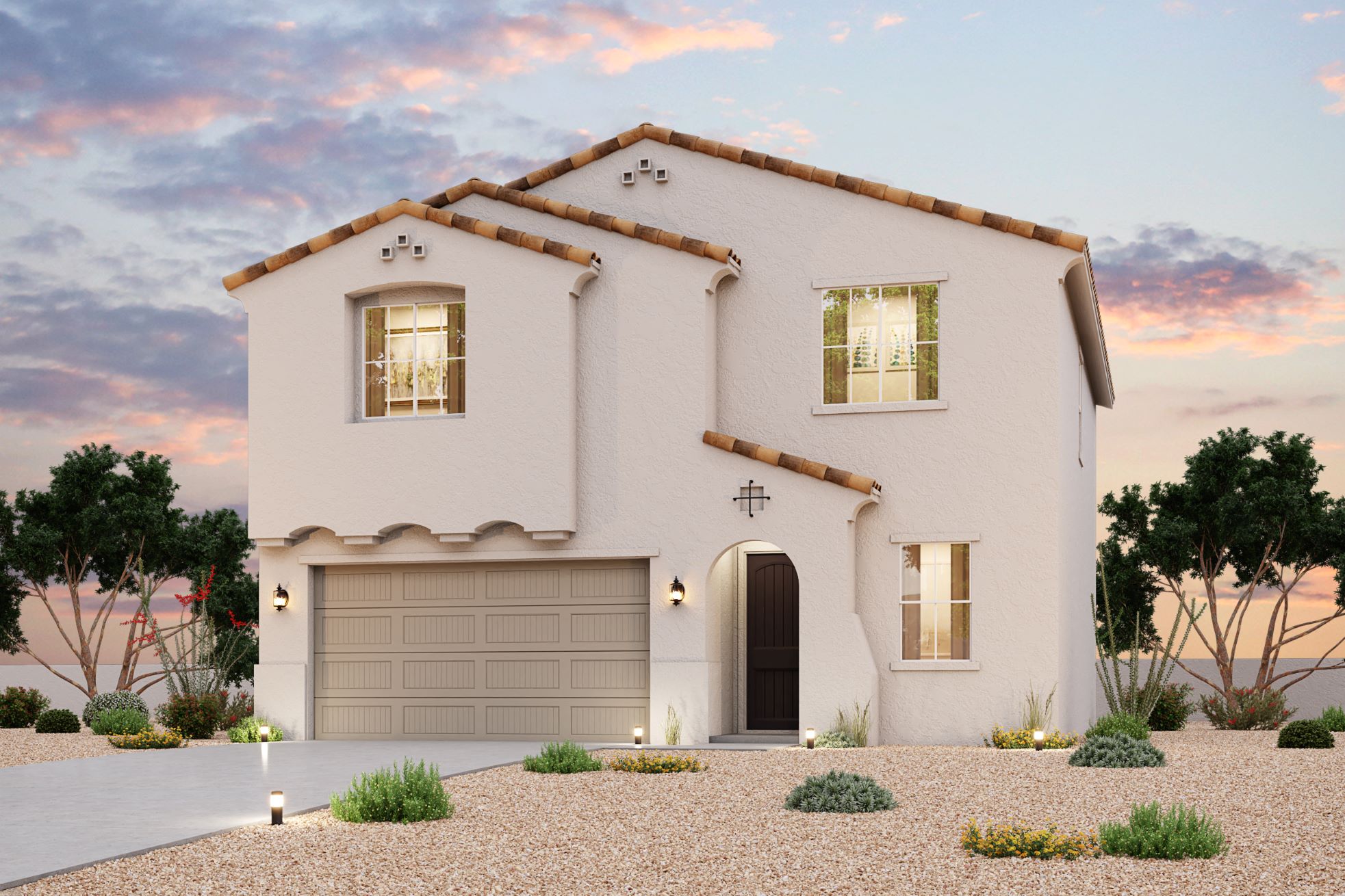 A white house with a garage.