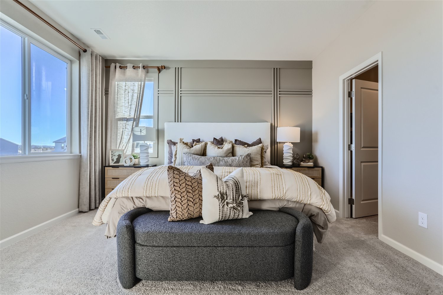 A bed with pillows and pillows.