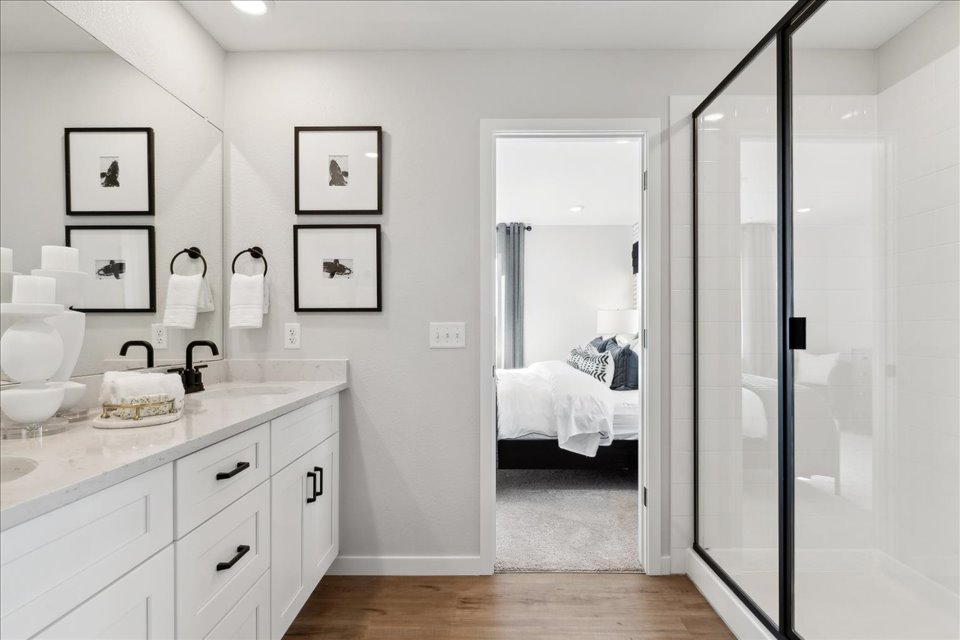 A bathroom with a glass shower.