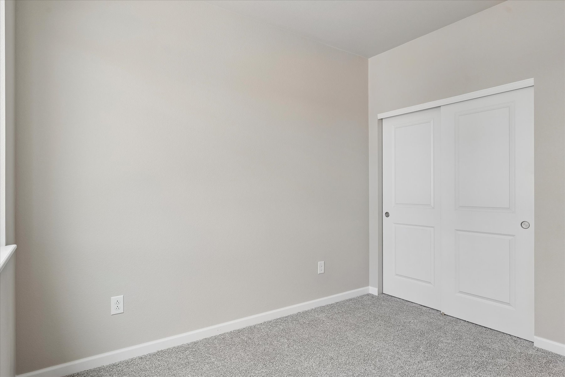A room with white doors.