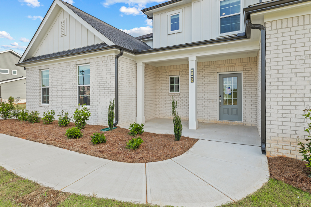 A house with a front yard.