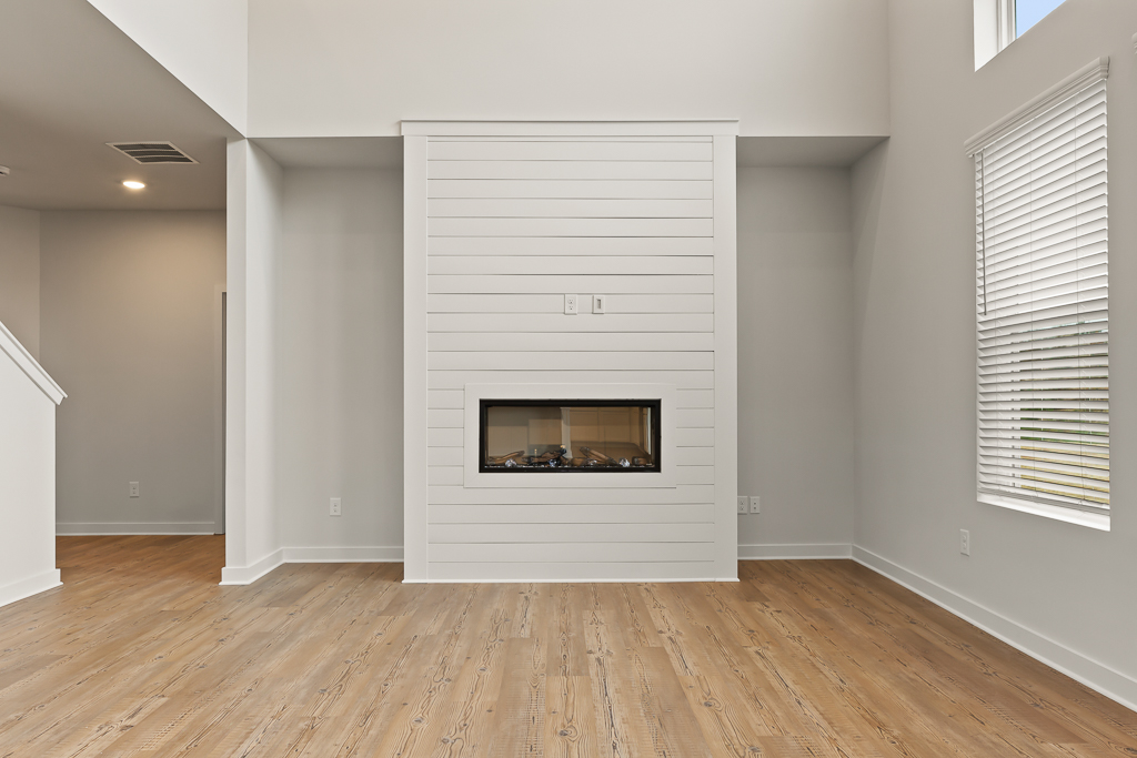 A fireplace in a room.