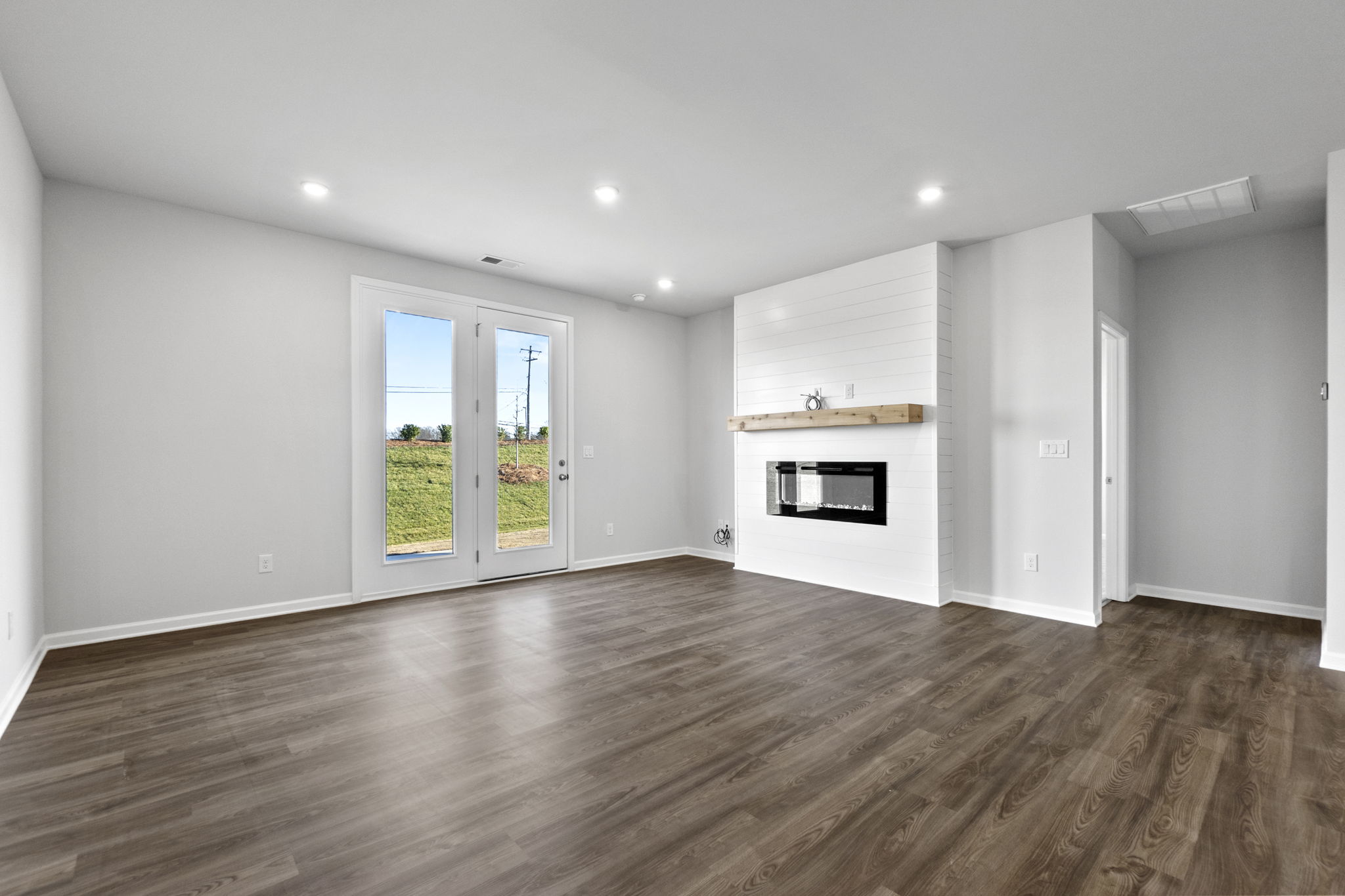 A large empty living room.