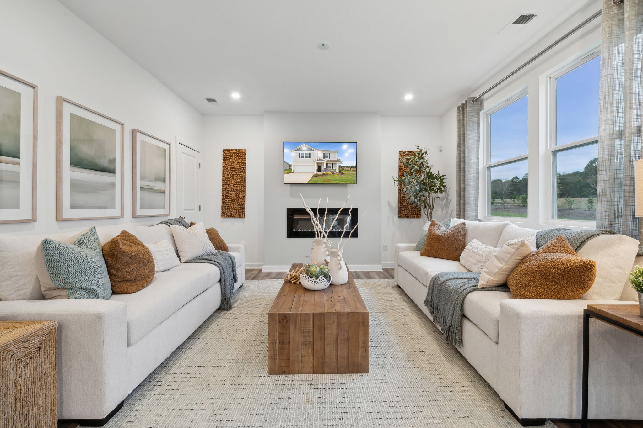 A living room with a large window.