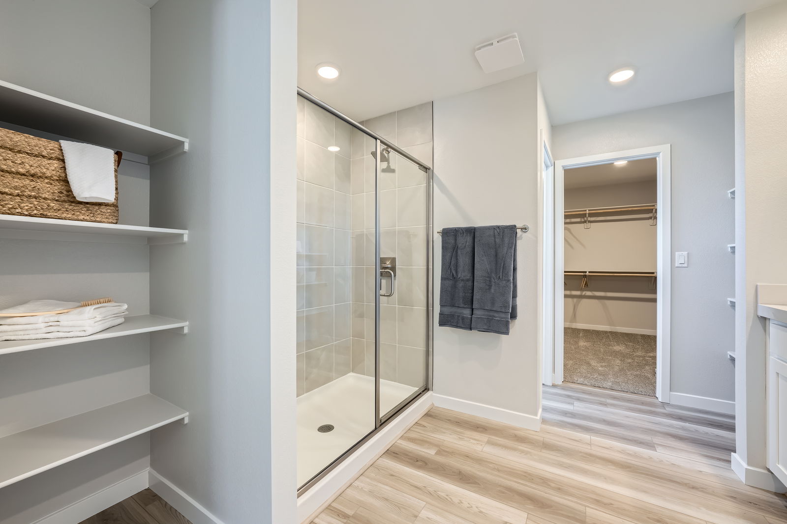 A bathroom with a glass shower.