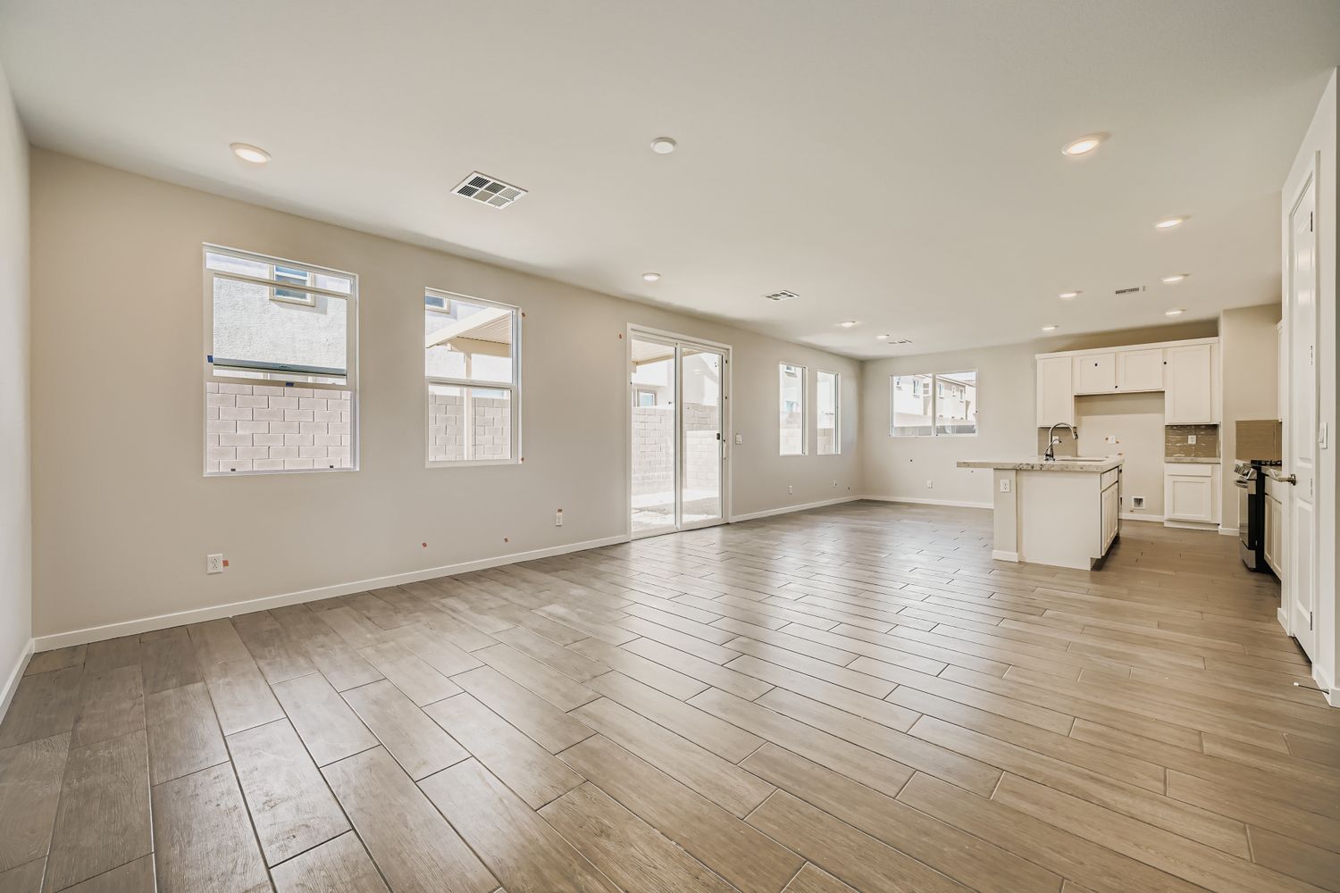 A large empty room with white walls.
