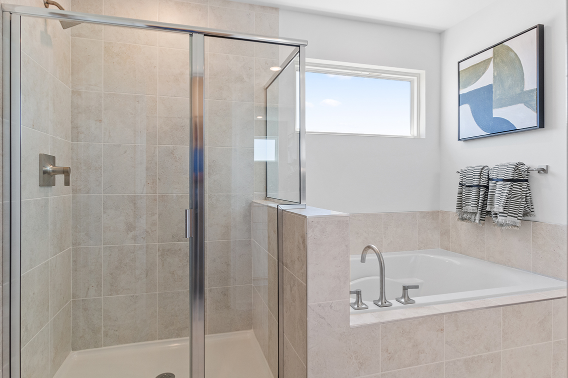 A bathroom with a glass shower.
