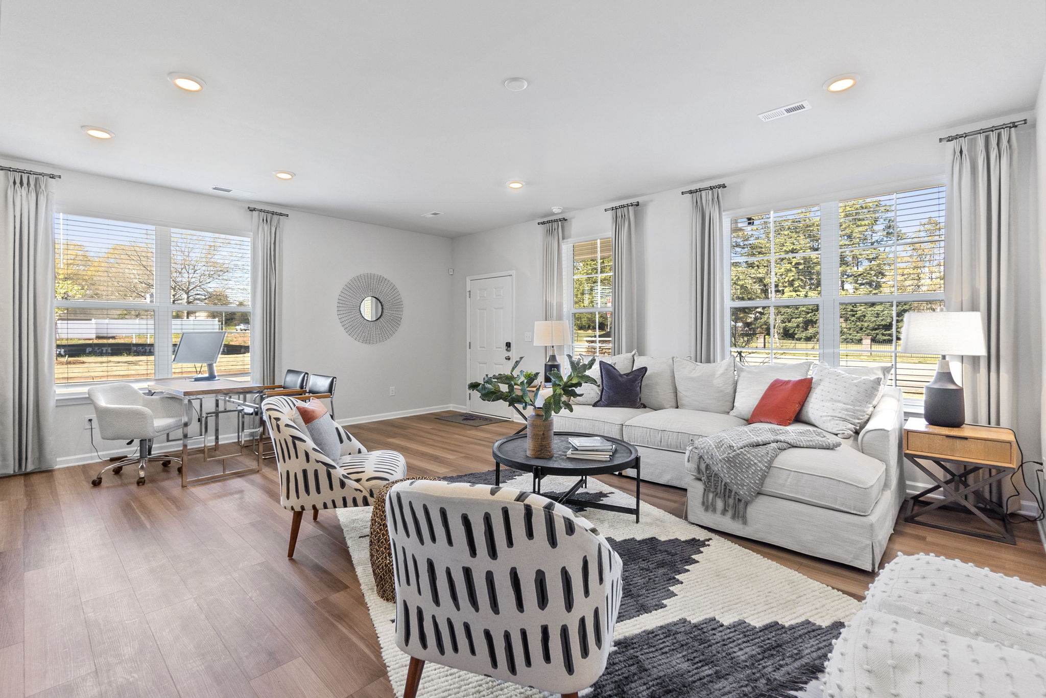 A living room with a large window.