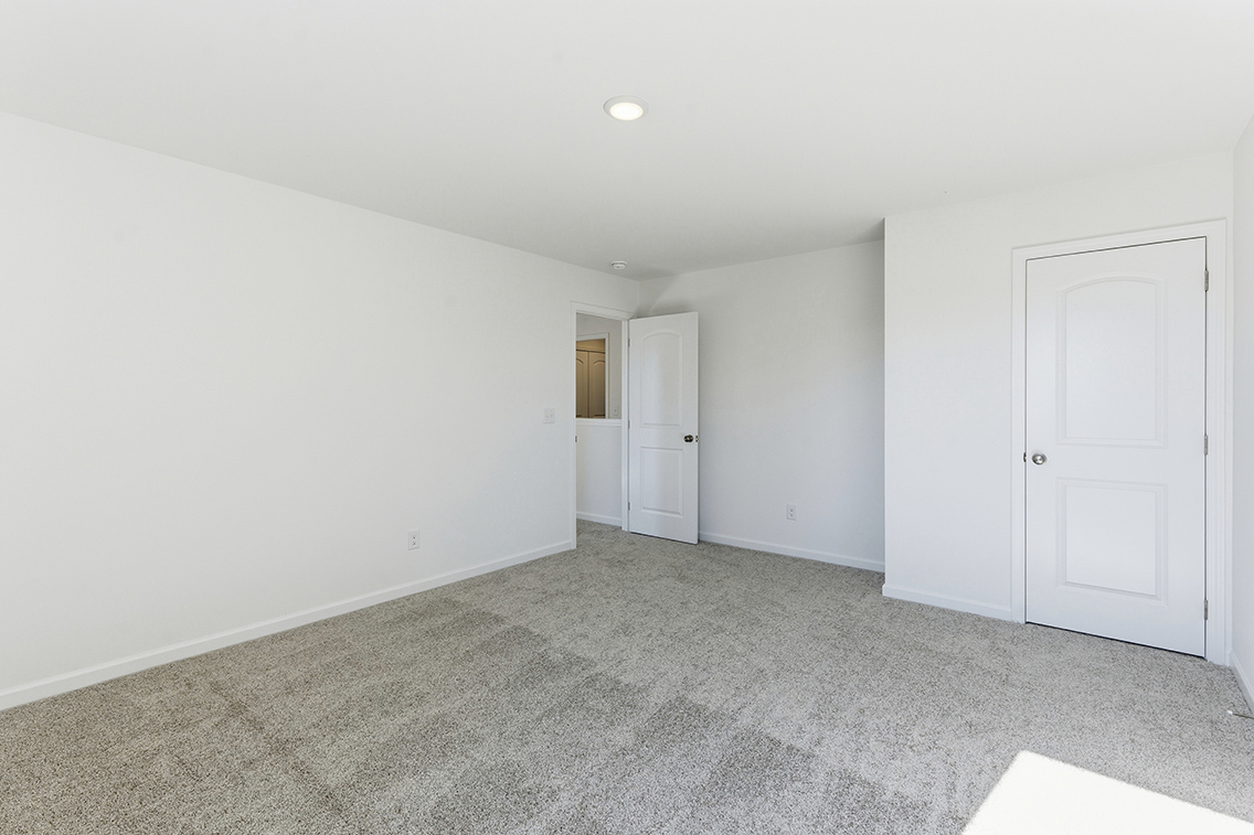 A room with white doors.