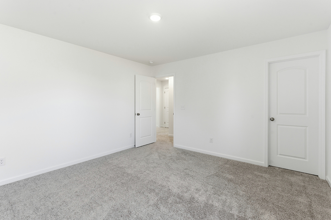 A room with white doors.