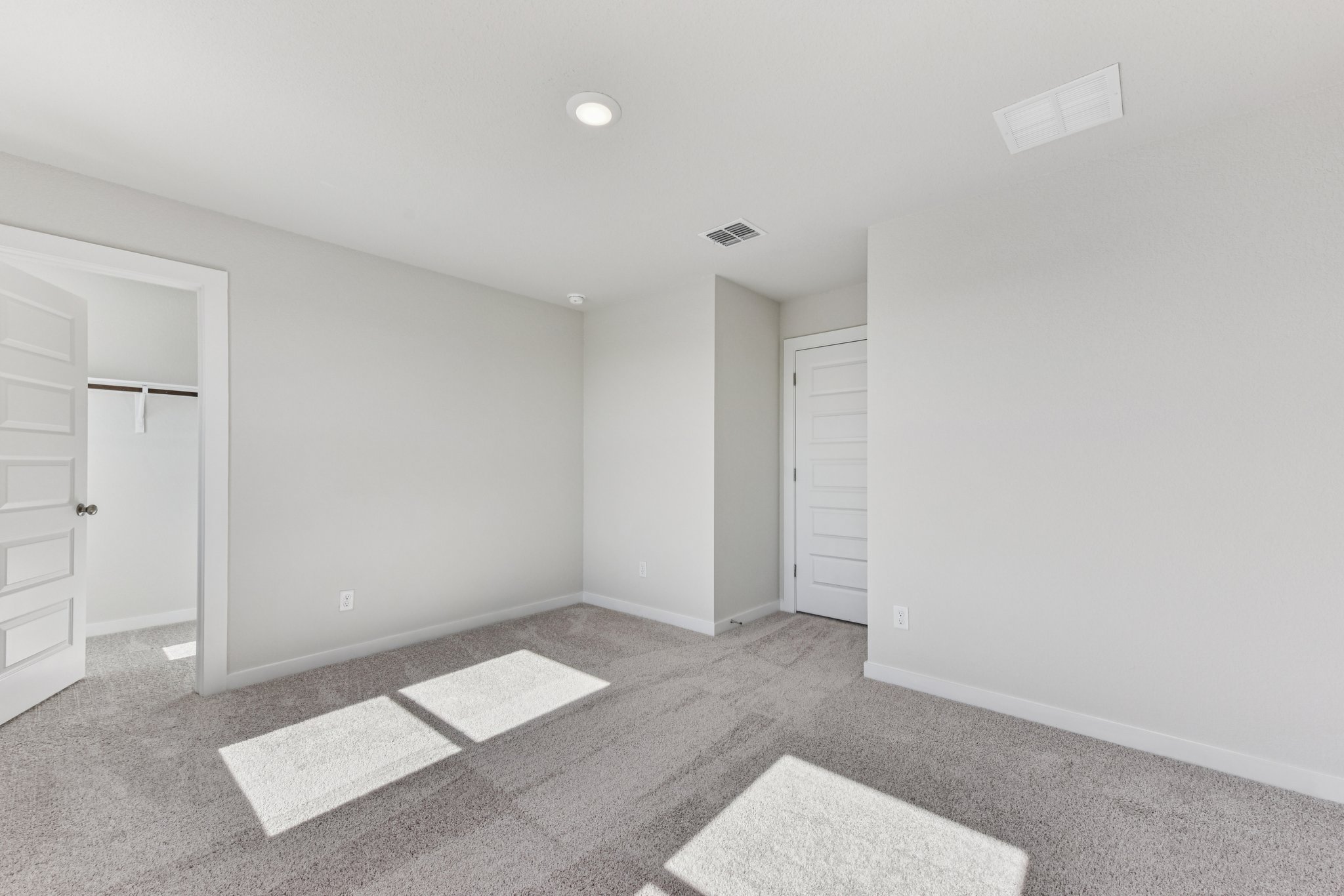 A room with white doors.