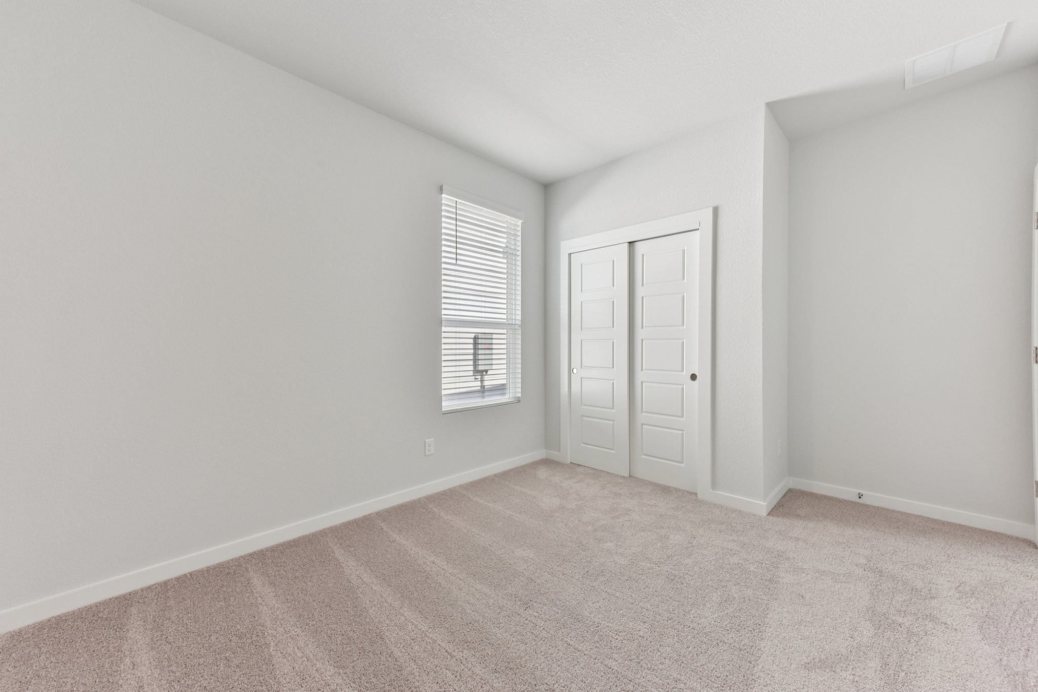 A room with white doors.