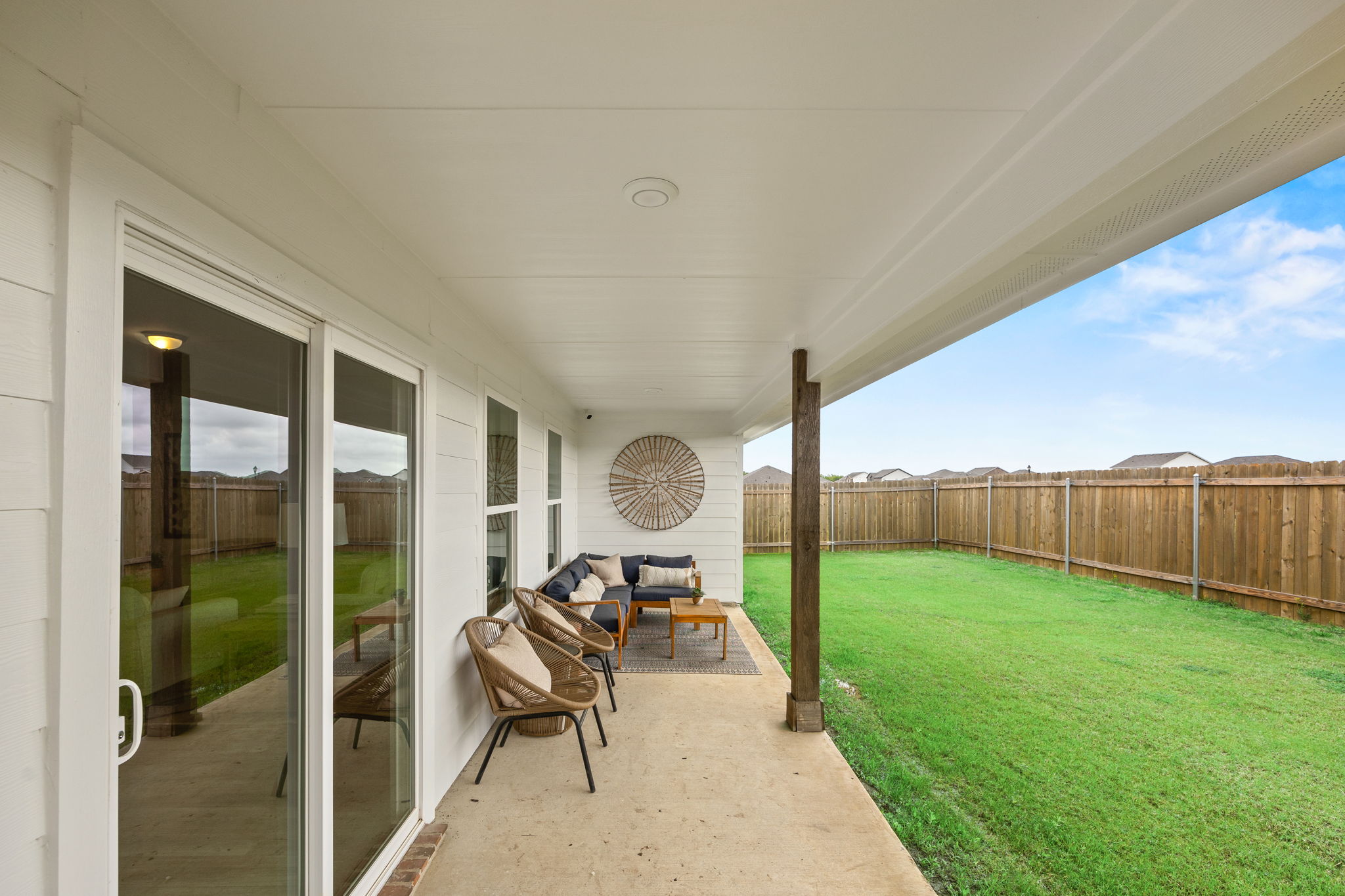 A room with a table and chairs.