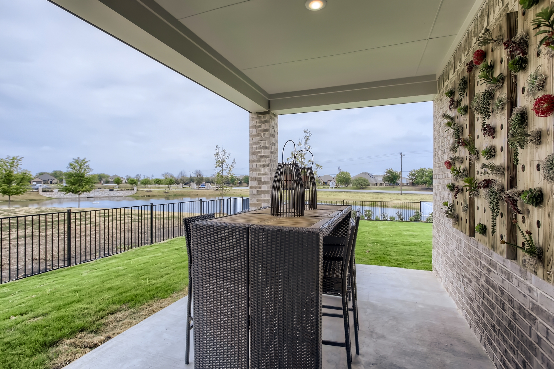 A table and chairs on a patio.