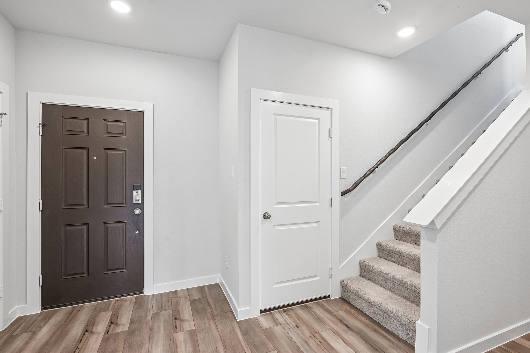A staircase leading to a door.