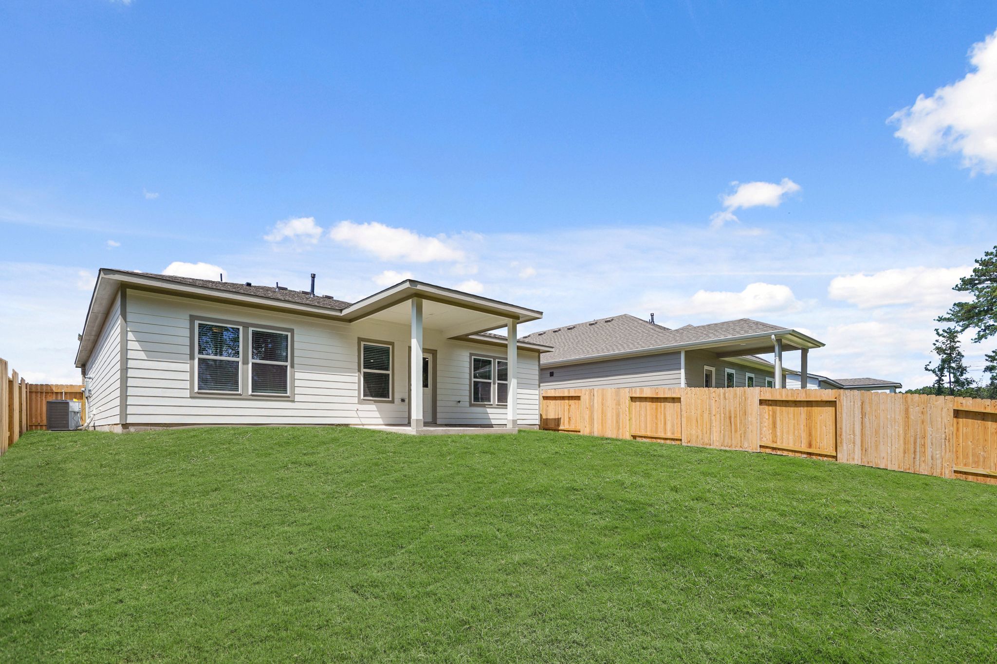 A house with a fence around it.