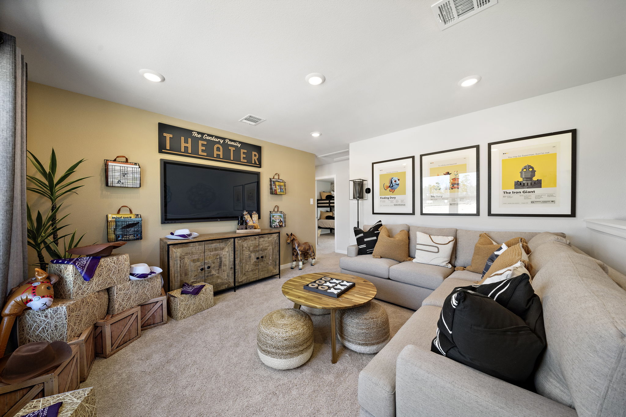 A living room with a tv and couches.