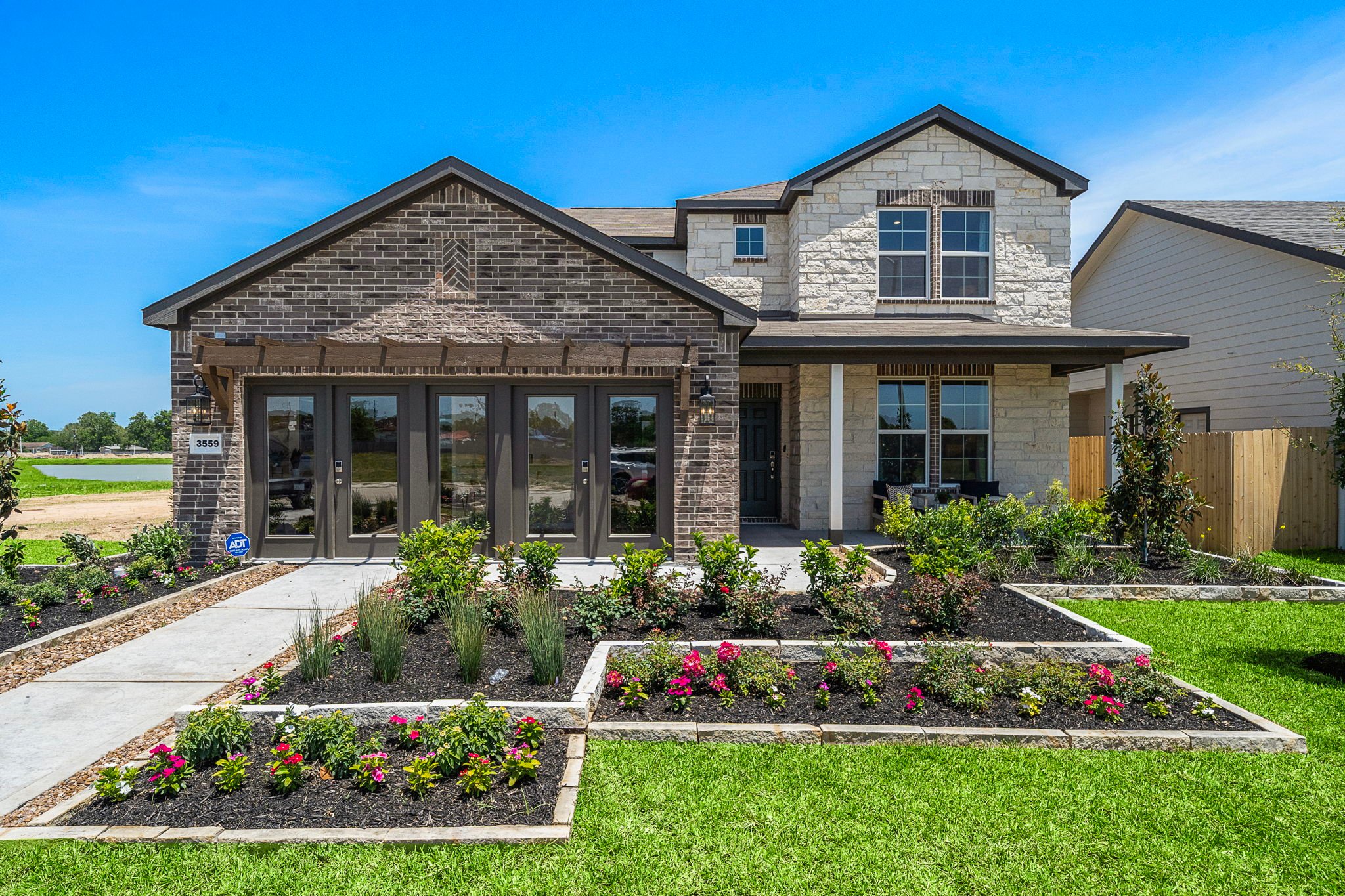 A house with a large front yard.