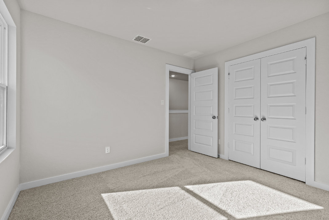 A room with white doors.