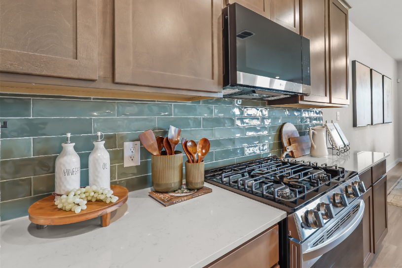 A kitchen with a stove and oven.