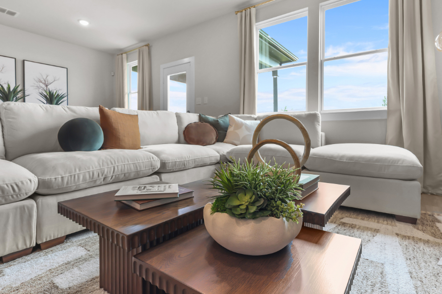 A living room with a large window.