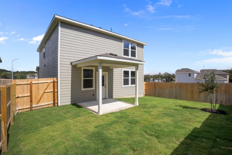A house with a fence around it.