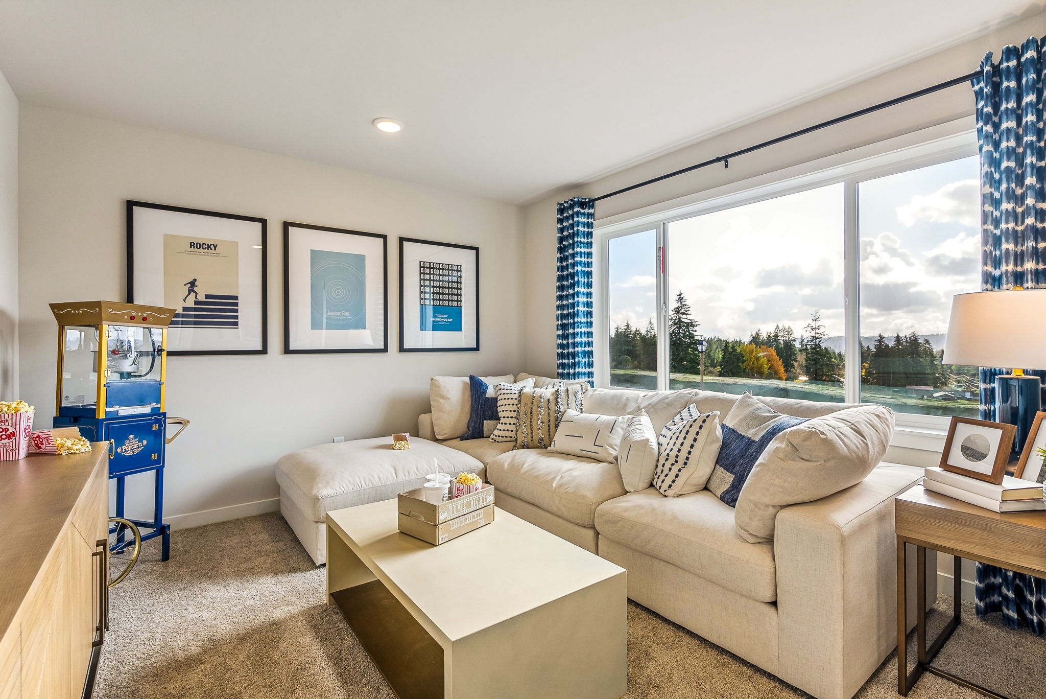 A living room with a couch and a coffee table.