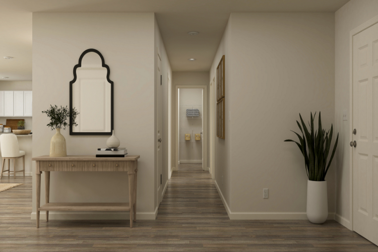 A room with a table and chairs.