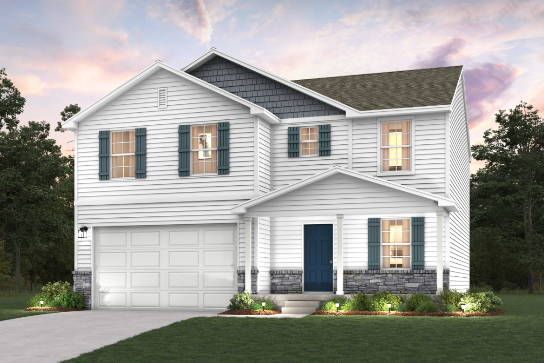 A white house with a garage.