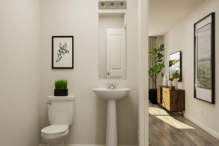 A bathroom with a sink and toilet.